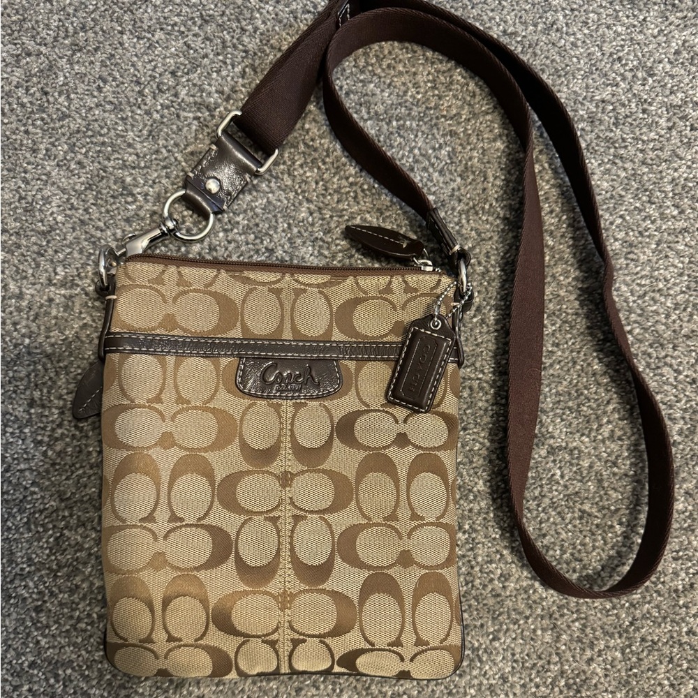 Coach crossbody, brown and tan. Bag is 9”X7” without the strap.